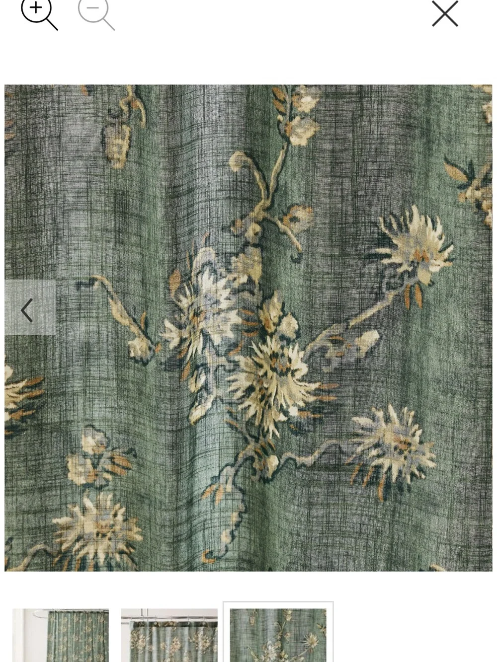 West Elm green floral shower curtain with cream and gold blooms